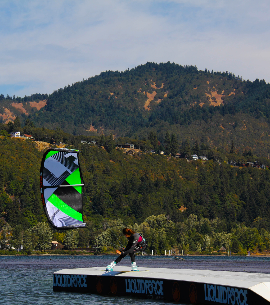 Sensi Graves kiteboarding on the slider with her Liquid Force kite