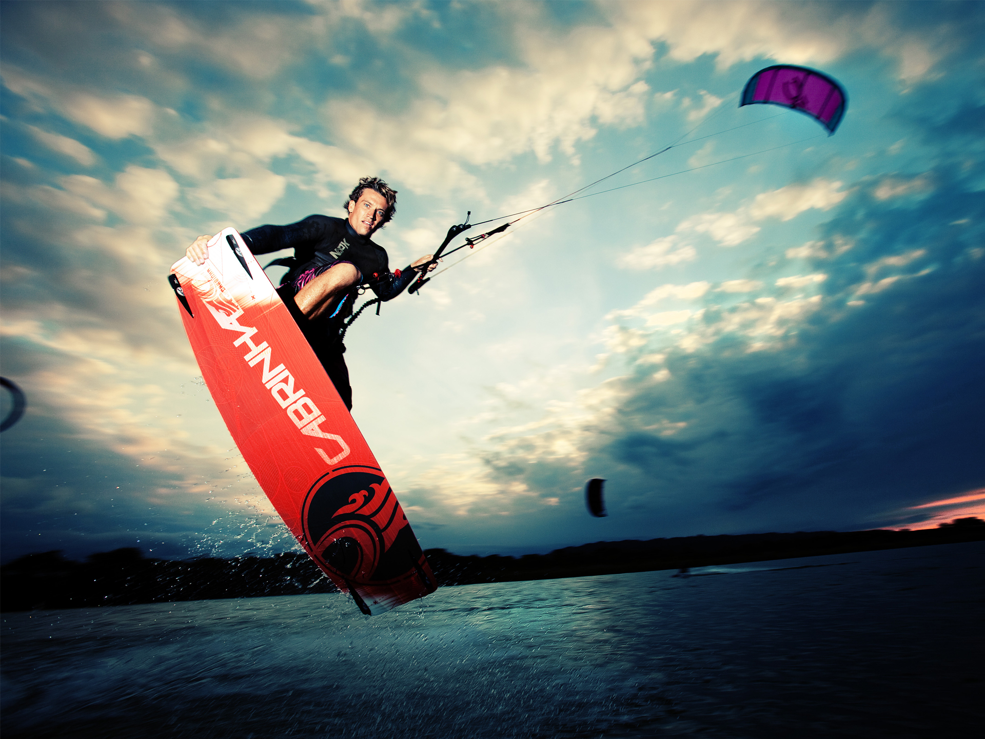 kitesurf wallpaper image - Damien LeRoy with a tailgrab at dusk on his Cabrinha kites gear - in resolution: Standard 4:3 1920 X 1440