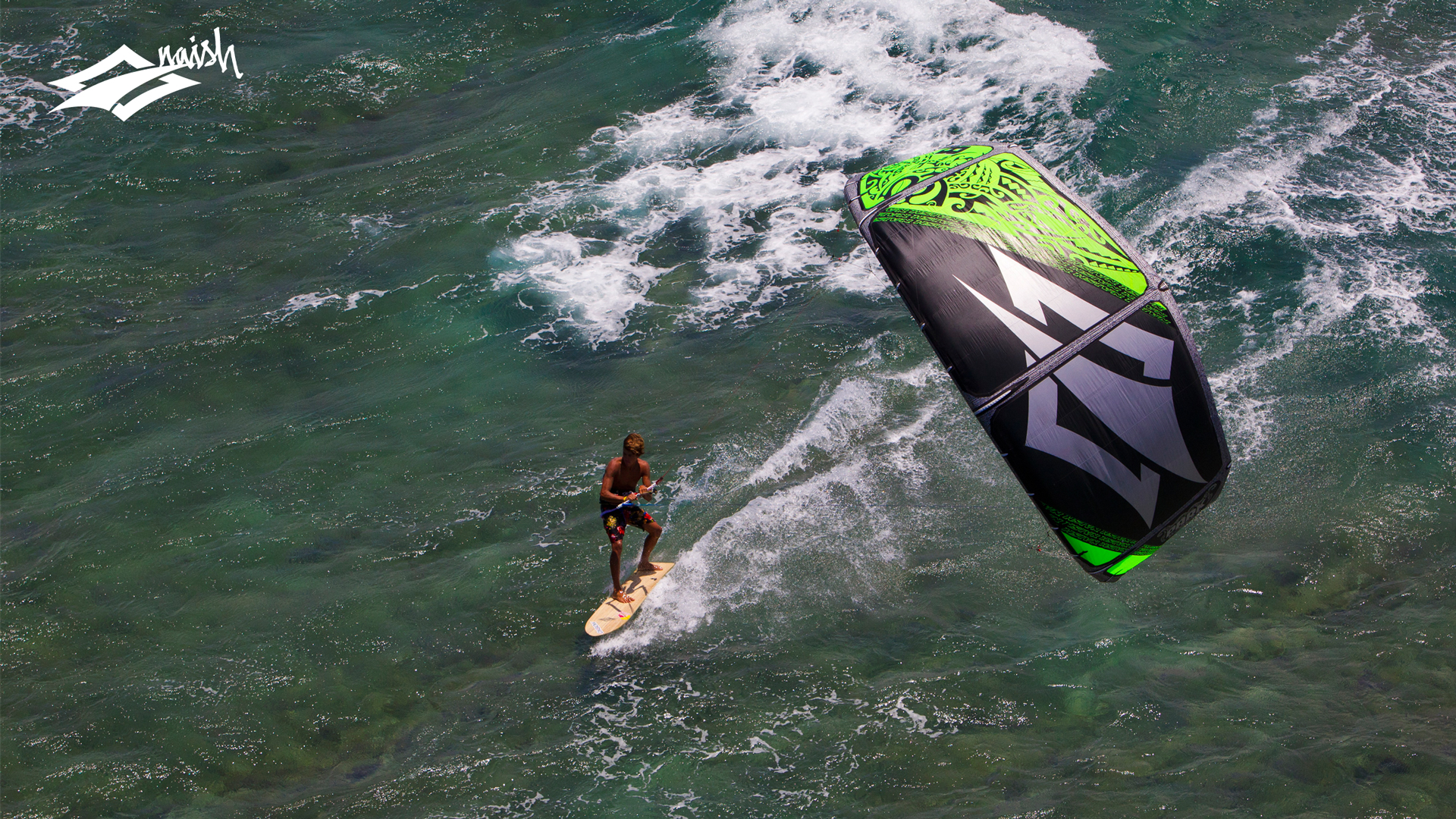 kitesurf wallpaper image - Kai Lenny cruising with the Naish Park kite and Alaia kiteboard off Hawaii - in resolution: High Definition - HD 16:9 1920 X 1080