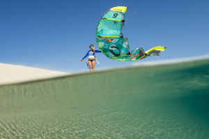 Susi Mai just hanging out with her Cabrinha kite on a sand dune